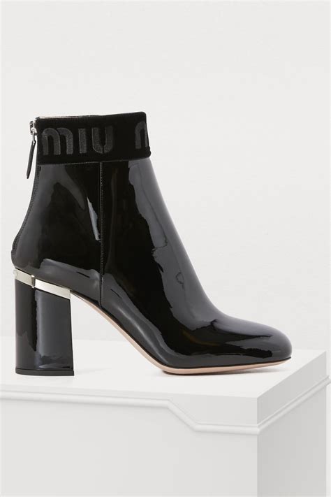 miu miu black patent boots|Patent leather boots Black/white .